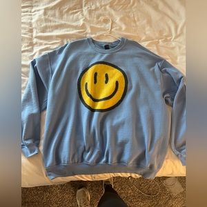 Blue smiley face crewneck